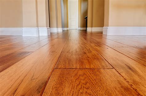Engineered wood floors will not contract or expand with the season like solid hardwood floors and can be installed on any level of your home, including below grade. What's Better: Solid vs Engineered Hardwood Flooring - LV ...