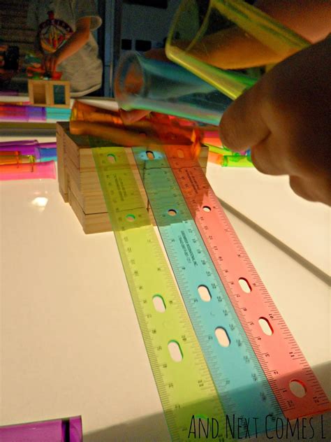 They can create constellations by shining their flashlights on the wall. Ramps on the Light Table {STEM Light Table Activity} | And ...