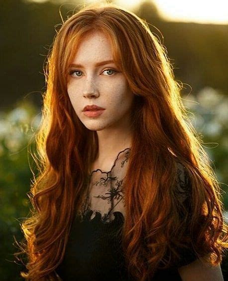 Stunning Redhead In Black Dress