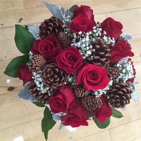 Maybe you would like to learn more about one of these? Red Roses Pine Cones and Babies Breath. Perfect for a ...