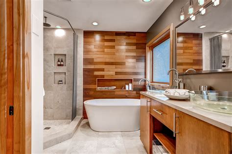 The stone wall and floor let you enjoy the bathroom at its most. Spa Like Master Bathroom Remodel | construction2style