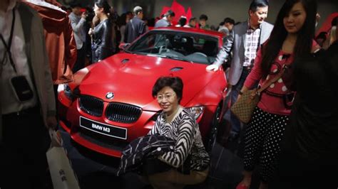 bmw takes china sales drive on the road