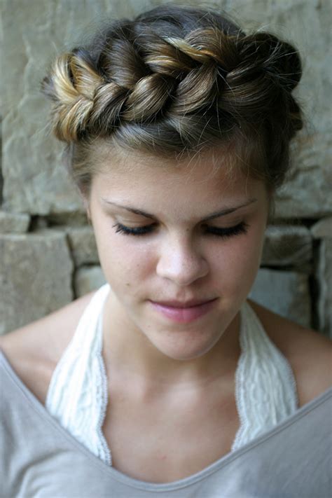 Braided 'dos are both protective and, clearly, gorgeous. Braided Crown Hairstyle | Sand Sun & Messy Buns