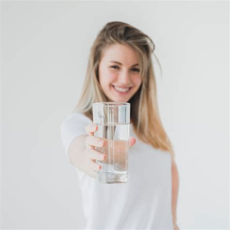 Premium Photo Healthy Girl Holding Glass Of Water