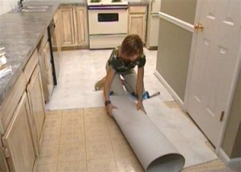 Dave shows how to install torlys laminate floors in the bathroom with the proper underlay and techniques. How to Install Self-Stick Floor Tiles | how-tos | DIY