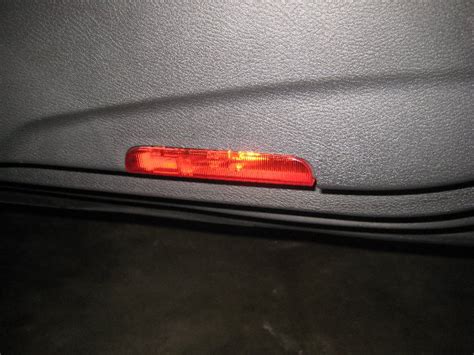 Nissan Maxima Door Panel Courtesy Step Light Bulb Replacement Guide 002