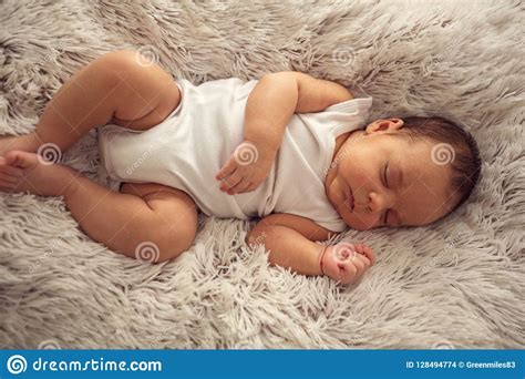 Infant Sleeps In A Dream Emotions Newborn Baby Sleeping Peaceful Stock
