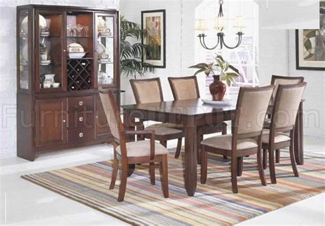 To further protect your tabletop, stop by a design center to order a custom table pad. Merlot Finish Transitional Dining Room Table w/Optional Items