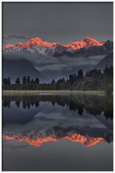 Sunset Reflection Of Lake Matheson Framed Print By Colin Monteath