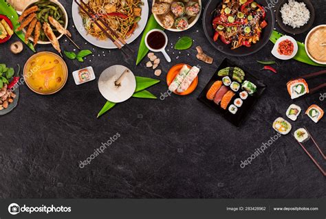 Asian Food Background With Various Ingredients On Rustic Stone