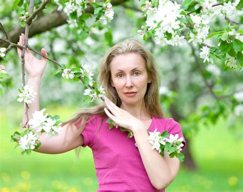 Young Woman Near The Blossoming Apple Tree Stock Image Image Of People Garden 30073471