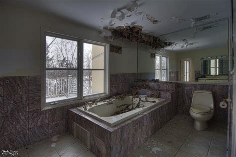 Decaying Bathroom Inside an Abandoned Waterfront Mansion in Ontario