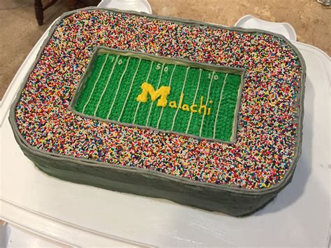 I was really impressed by how beautifully it was decorated to look like a soccer ball. Michigan football stadium cake | Football birthday cake