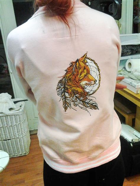 Embroidered hoodie with fox dreamcatcher design - Embroidery on ...