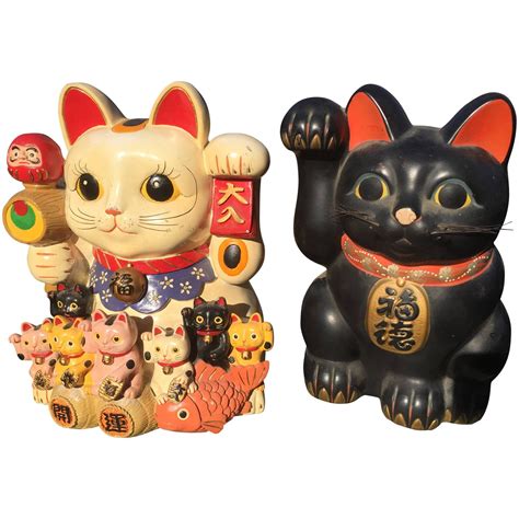It may be malevolent, playful, or beneficial. Japanese Big Red and Blue Antique Good Fortune Money Cats ...