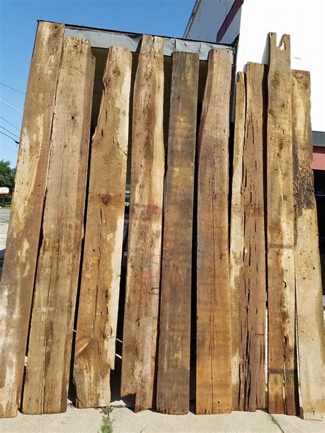 Old barn wood boards, siding, paneling, and hewn beams; Old Is Better Than New - Reclaimed Wood Lumber, Old ...