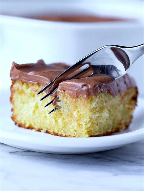 Start with a box of yellow cake mix and using the recipes below create a new gourmet favorite! Easy Sour Cream Cake with Creamy Chocolate Frosting - Cookies and Cups