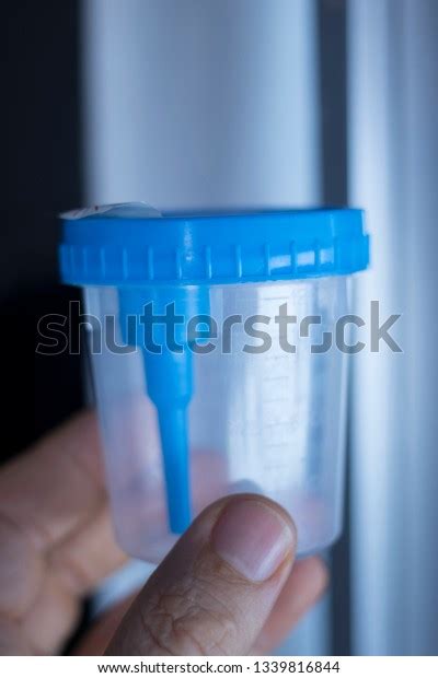 Medical Urine Test Cup Hold Patient Stock Photo Edit Now 1339816844