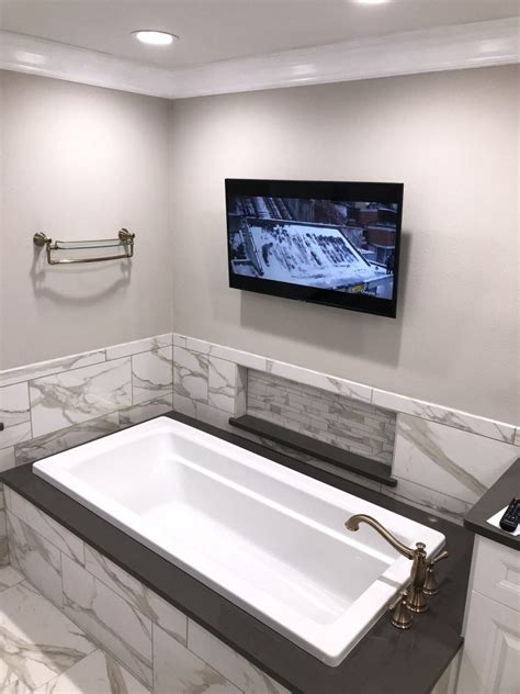 Designed with spaces in mind, we are introducing the latest design trends, styles, and space ideas to help you envision your perfect look. Luxury Master Bath with Champagne Bronze Tub Filler and Towel Bars | Kitchen Bath & Beyond 813 ...