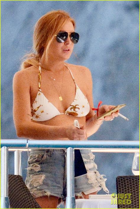 Lindsay Lohan Flashes Black Bra Underwear At FIA Formula Dinner Photo Bikini