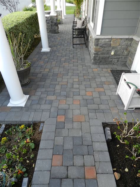 Patio pavers are available in a wide variety of shapes, colors, and materials that can be combined to create an almost infinite amount of patterns. Pavescapes Paver overlay installed in the front yard patio ...