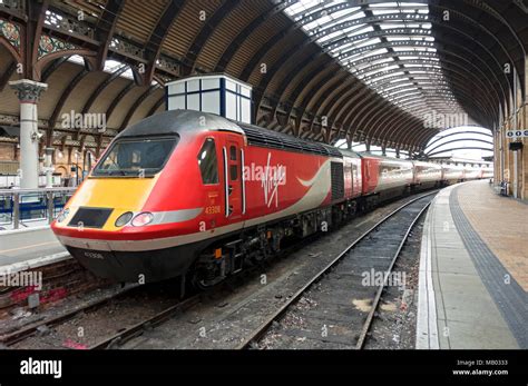 Virgin Trains High Speed Passenger Train Waiting At The Station Stock