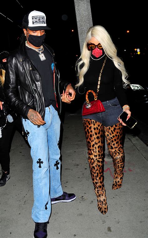 Which saweetie tries to pick up. Saweetie Steps Out in Bold Christian Louboutin Thigh-High ...