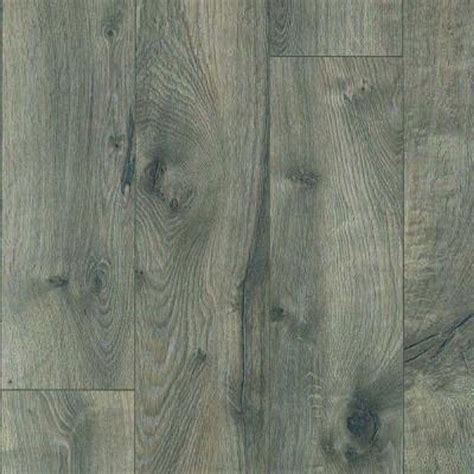 Many people have complained that their name brand pergo turned out to be just as easily damaged in spray zones as the $0.79/sf laminate available at discount flooring stores. Pergo XP Southern Grey Oak Laminate Flooring - 5 in. x 7 ...