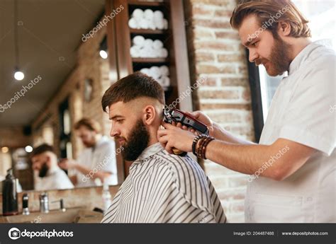 Barber Shop Men Hair Cut Barber Doing Men Fashion Hairstyle Stock Photo