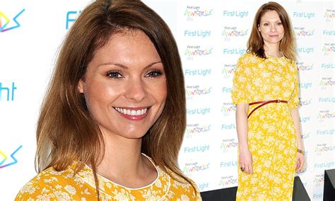 downton abbey s myanna buring opts for vintage elegance in a pretty cornflower yellow floral