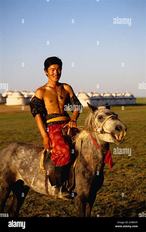 Young Mongolian Horseman At Nadam Summer Festival On Grasslands Of