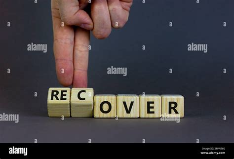 Time To Recover Symbol Businessman Turns Wooden Cubes And Changes The