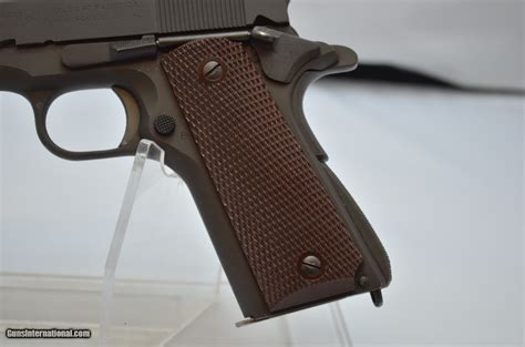 Inspect the work (visually and physically inspect the finished custom 1911 for errors). Colt 1911-A1 .45ACP 5" Barrel 1943 MFT Col. Waldemar S Broberg Inspection stamp