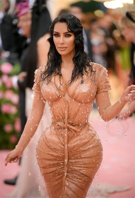 kim kardashian is quite literally dripping in crystals in her bodycon met gala dress