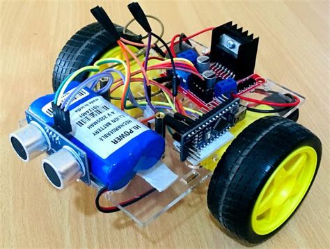 Obstacle Avoiding Robot Using Arduino And Ultrasonic Sensor Arduino Projects Arduino Arduino