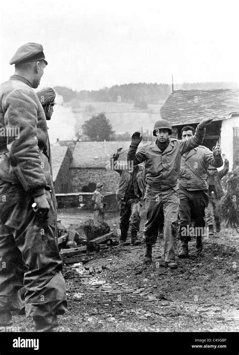American Soldiers Surrender To A Unit Of The Weapon Ss 1945 Stock