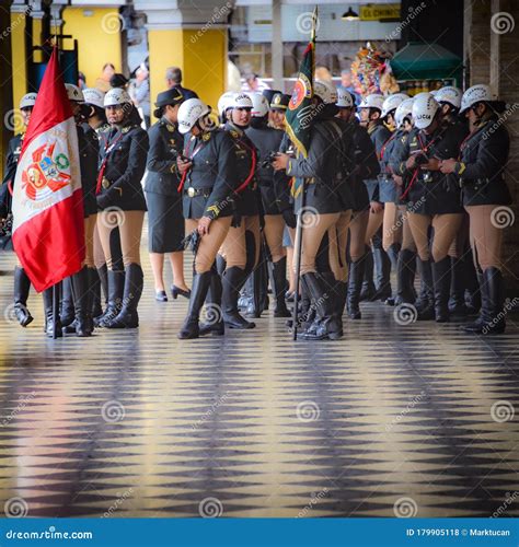 Female Officers From The Peruvian Police Force In The Plaza De Armas