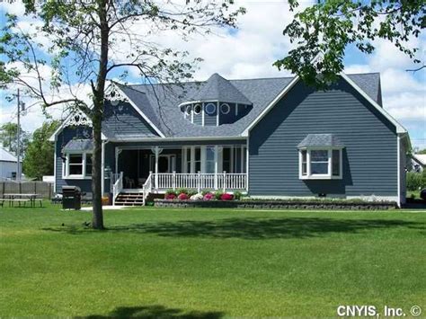 Lovely Newer Victorian Style Ranch Lake Home In Three Mile