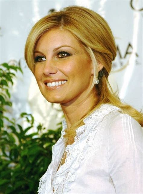 Faith Hill With Her Long Hair Tied Back Closely To The Head