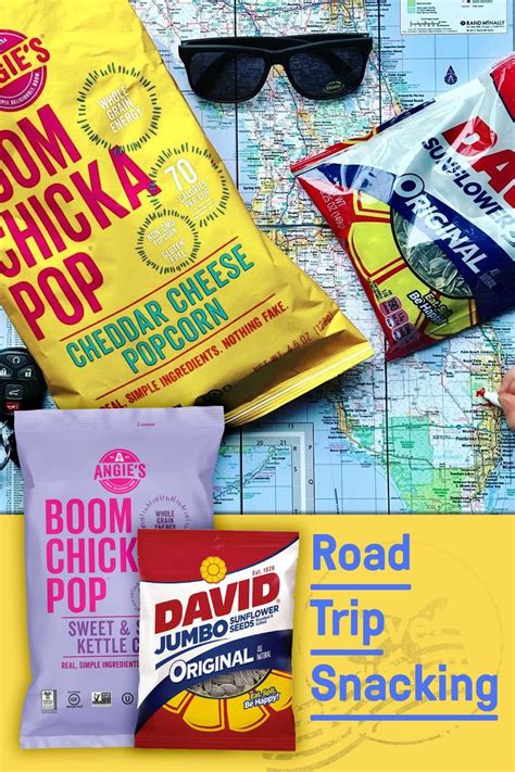 The Road Trip Snacks Are On Display In Front Of A Map With Sunglasses And Maps