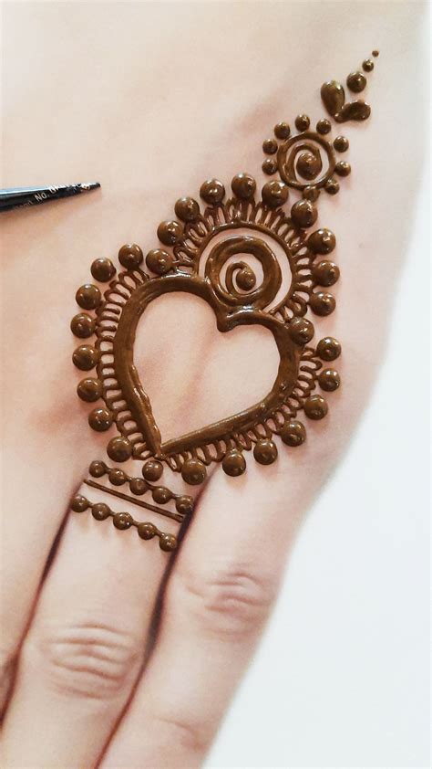 Heart Shape Mehndi Design For Back Hand Mehndi Photos Gallery