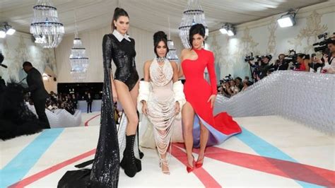 kardashian clan rift kendall jenner steals the show over kim at met gala while khloe and