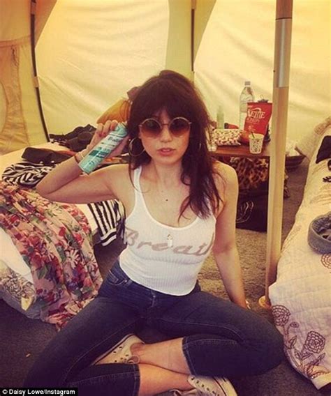 daisy lowe reveals a hint of cleavage in plunging skintight catsuit at glastonbury daily mail