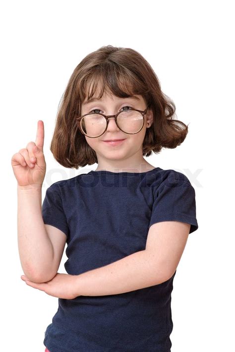 Little Girl In Round Spectacles Raising Finger In Attention Gesture