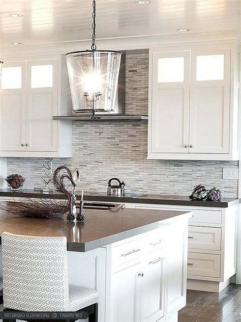 To clean kitchen cabinets that have painted surfaces, the safest and most effective method is to wipe down with mild dish soap and warm water. 23+ Best Modern White Kitchen Cabinets and Backsplash ...