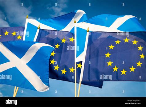 Flags Of Scotland And The European Union Flying Together In The Spirit