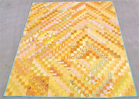 Triangle pile up | crazy math teacher lady. All-Yellow Scrappy Trips Around the World Quilt Finished! | Whipstitch