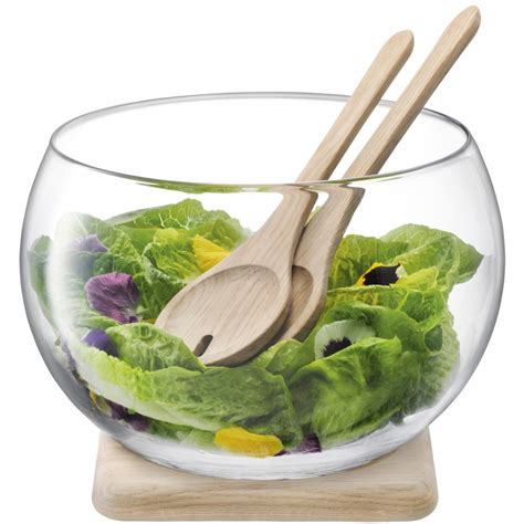 A Handmade Glass Salad Bowl With Oak Salad Servers And Oak Base This