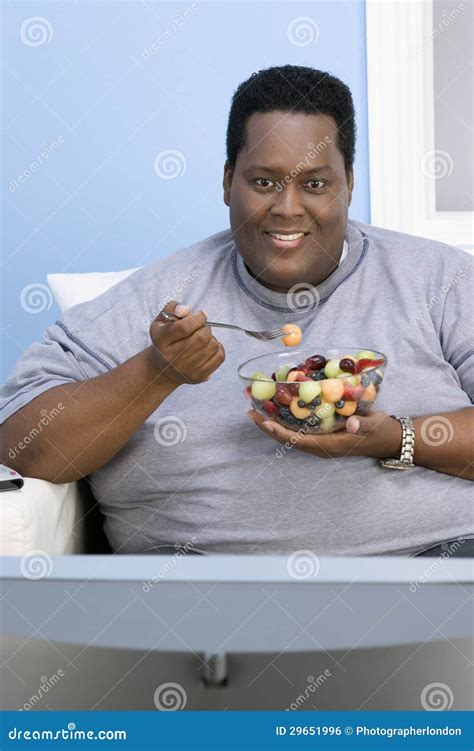 Obese Man Eating Fruits Royalty Free Stock Image Image 29651996