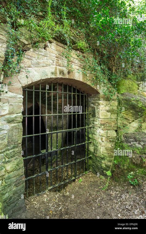 Entrance To Caves Below Beeston Castle In Cheshire England Stock Photo